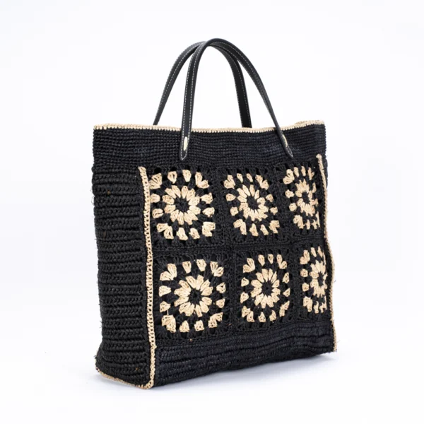 sac en raphia noir et lanières de cuir noir à motifs beige