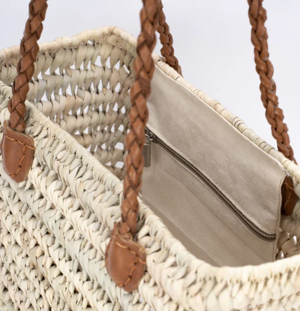 Sac en raphia beige avec des lanières en cuir marron